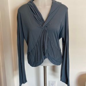 Bluish grey blouse.